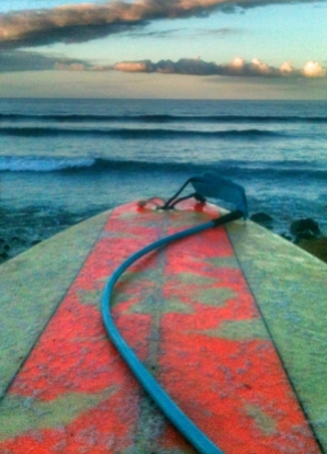 surfing maui guardrails surfboard red