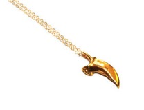 bear claw gold necklace sports illustrated